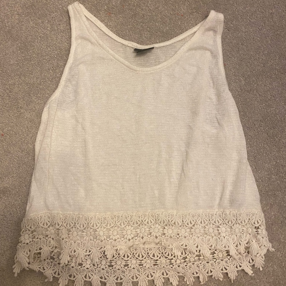 Tank top with frill at end.